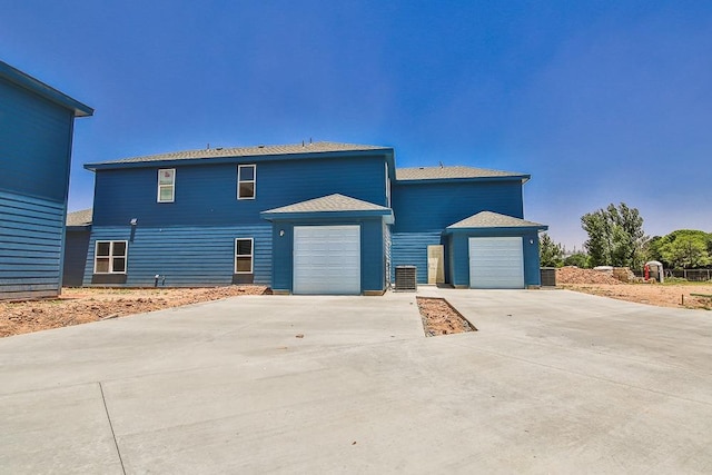 exterior space with a garage