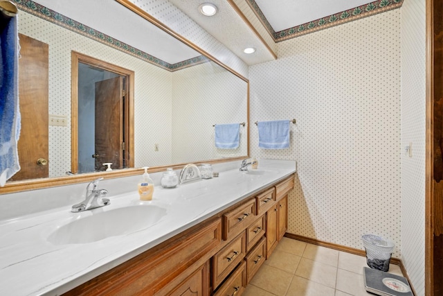 bathroom featuring tile patterned flooring and vanity