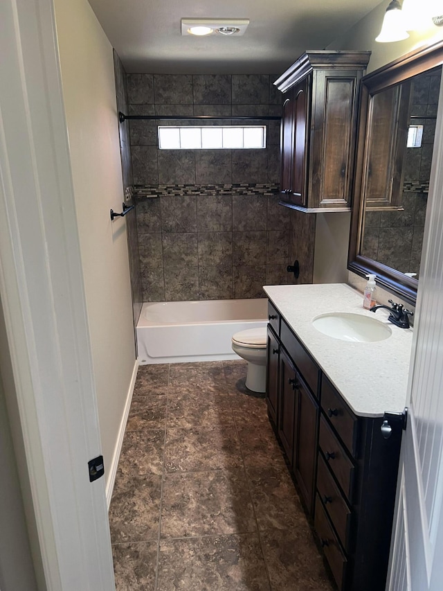 full bathroom featuring baseboards, toilet,  shower combination, and vanity