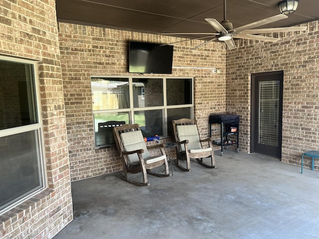 view of patio / terrace featuring a ceiling fan