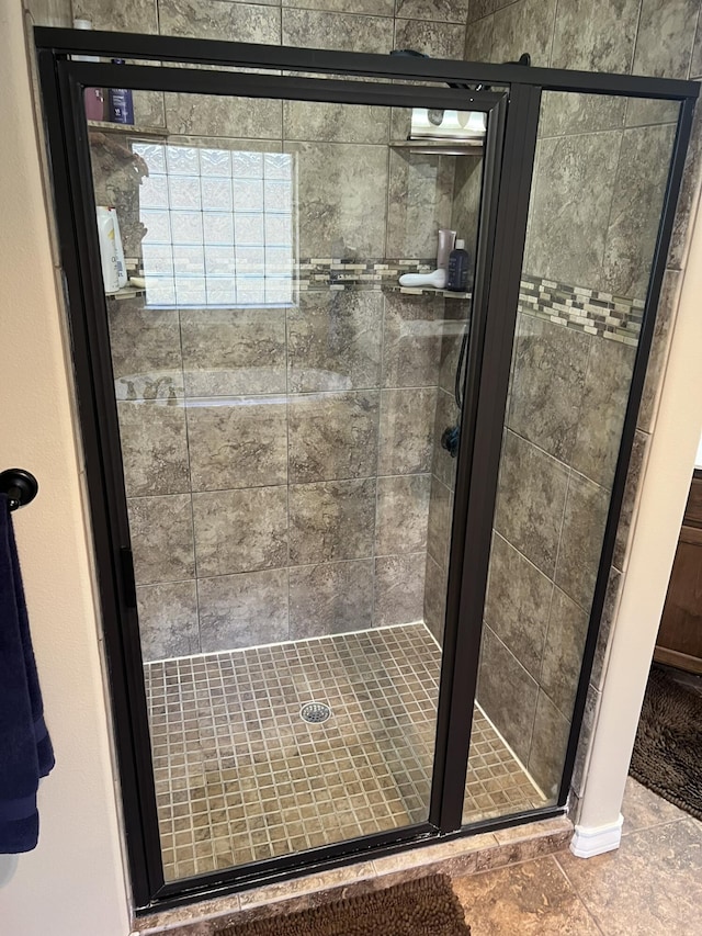 bathroom featuring a stall shower