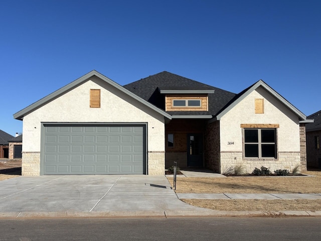 view of front of property featuring a garage