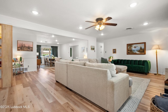 6405 Joliet Ave, Lubbock, TX 79413 - living room featuring a ceiling fan, recessed lighting, and light wood-style flooring