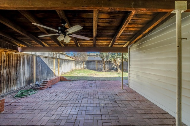 view of patio featuring ceiling fan