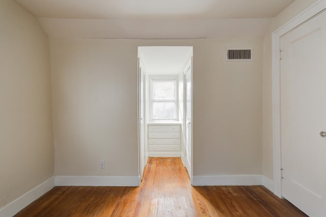 empty room featuring wood-type flooring