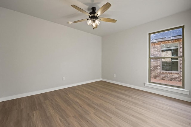 unfurnished room with light hardwood / wood-style floors and ceiling fan