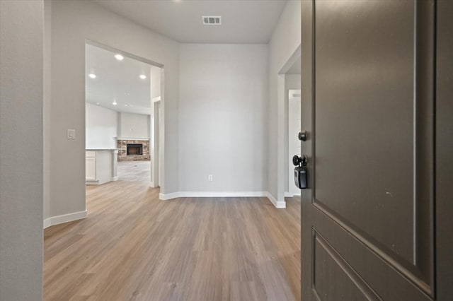 hall featuring light hardwood / wood-style floors