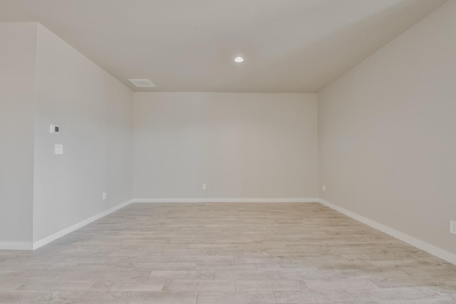 unfurnished room featuring light wood-type flooring