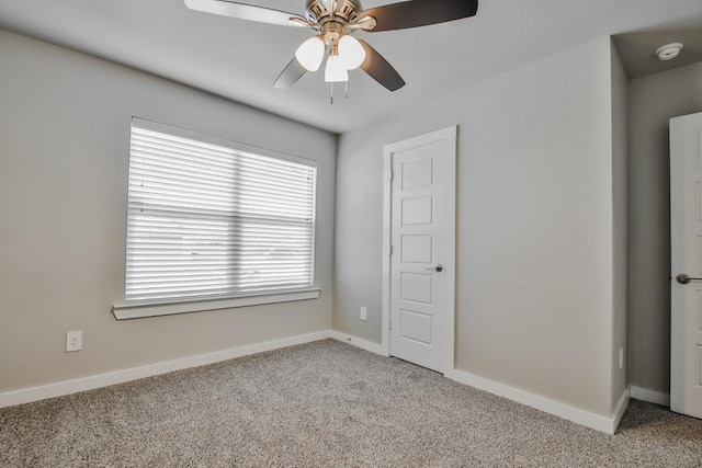 unfurnished bedroom with light carpet and ceiling fan