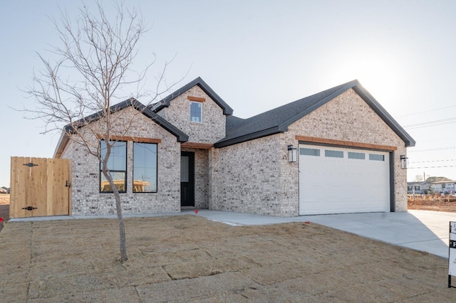 view of front of property featuring a garage