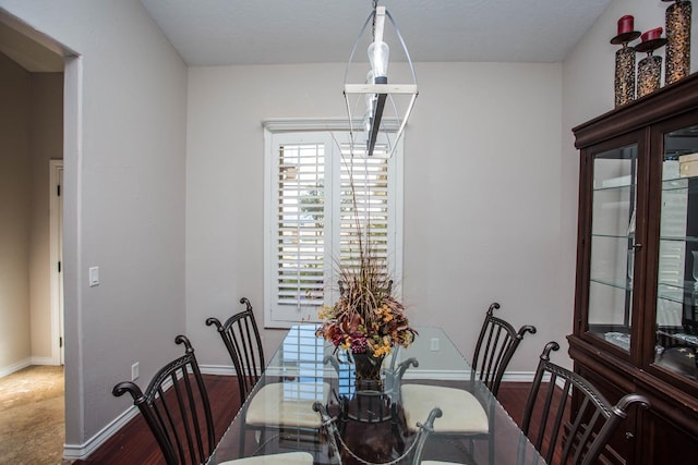 dining room with hardwood / wood-style floors