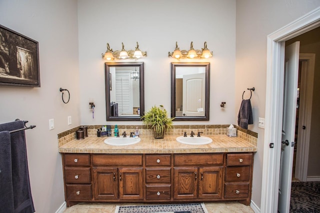 bathroom with vanity and backsplash