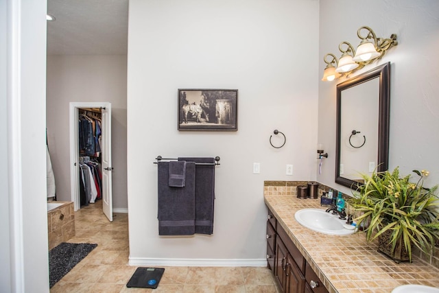 bathroom with vanity and tile patterned floors