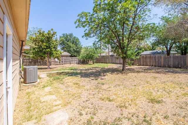 view of yard with central AC unit