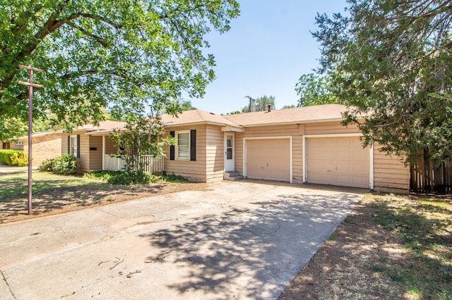 single story home with a garage