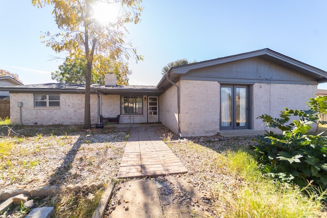 rear view of property with a patio area