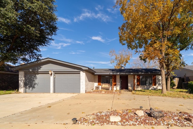 single story home featuring a garage