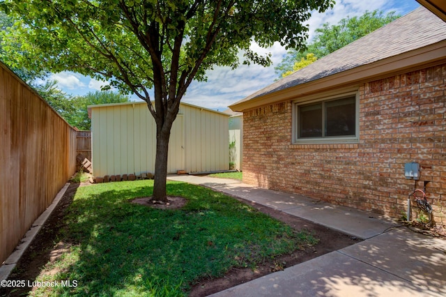 4801 Amherst St, Lubbock, TX 79416 - fenced backyard with an outdoor structure and a patio
