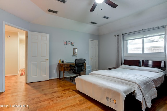4801 Amherst St, Lubbock, TX 79416 - bedroom with light wood-style floors, lofted ceiling, an office area, and a ceiling fan
