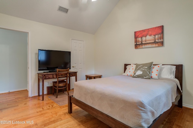 4801 Amherst St, Lubbock, TX 79416 - bedroom with light wood-type flooring, high vaulted ceiling, and a ceiling fan