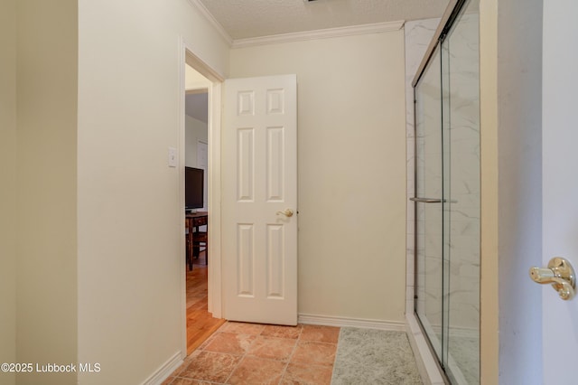 4801 Amherst St, Lubbock, TX 79416 - bathroom featuring a shower stall, crown molding, and a textured ceiling