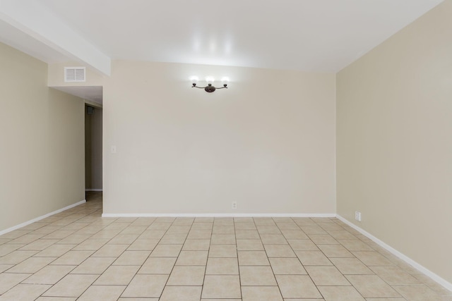 empty room with beam ceiling