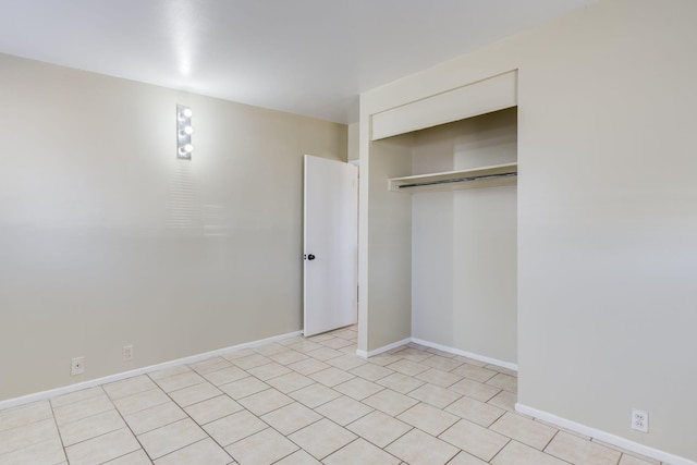 unfurnished bedroom with a closet