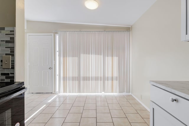 interior space with light tile patterned flooring