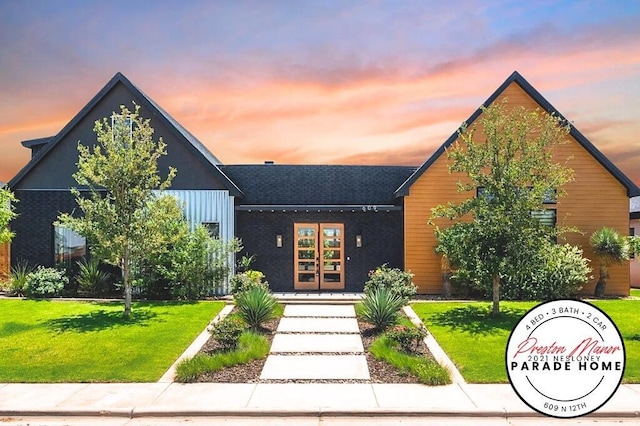 view of front of home with a front lawn