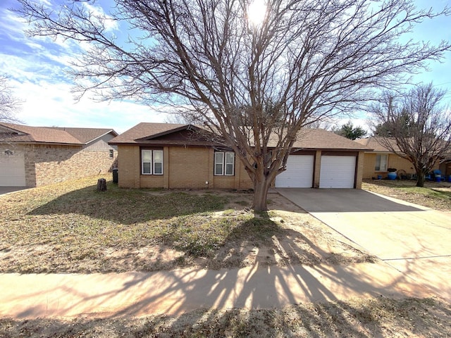 single story home with a garage