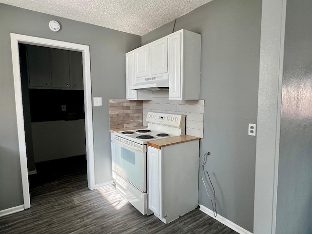 4507 54th St, Lubbock, TX 79414 - kitchen with white electric range, under cabinet range hood, dark wood finished floors, decorative backsplash, and white cabinets