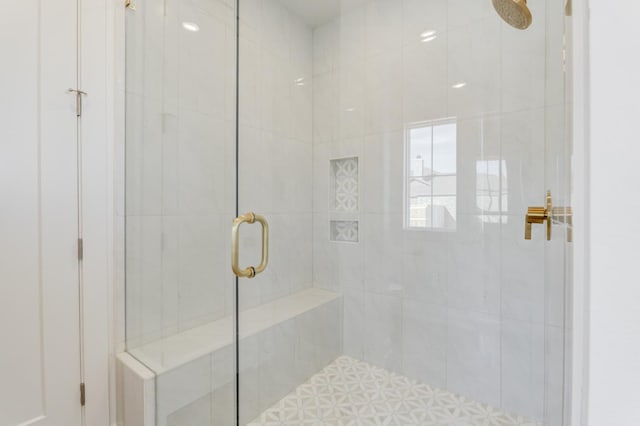 bathroom with an enclosed shower