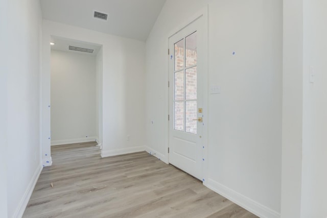 doorway to outside featuring light hardwood / wood-style floors