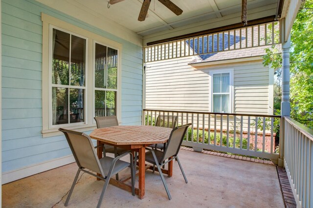 view of patio featuring ceiling fan