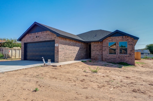 view of front of property with a garage