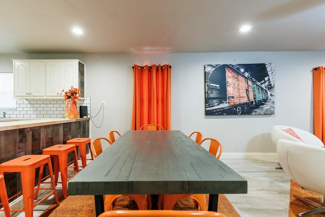 dining room featuring light hardwood / wood-style flooring