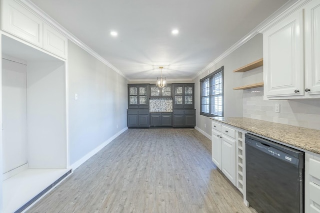 kitchen with white cabinetry, crown molding, black dishwasher, light hardwood / wood-style floors, and backsplash