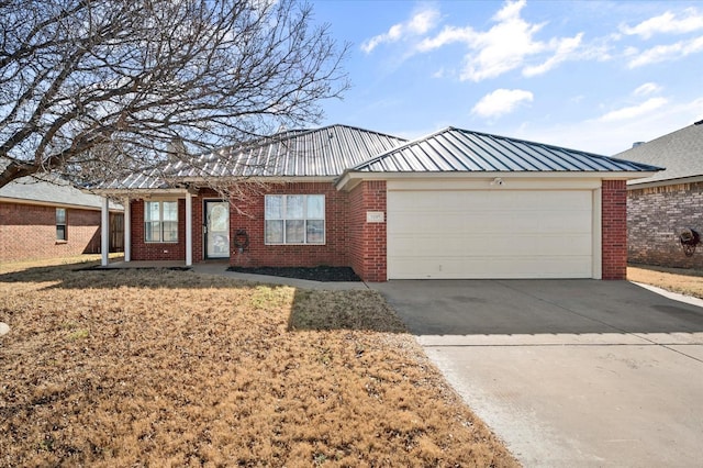 single story home featuring a garage