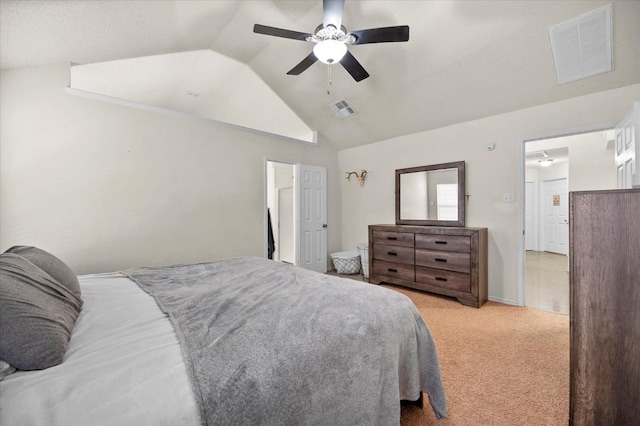 bedroom with light carpet, lofted ceiling, and ceiling fan