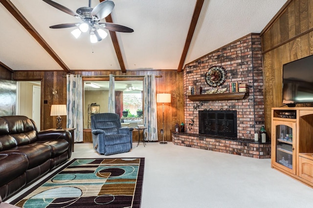 living room featuring carpet flooring, wooden walls, and a brick fireplace