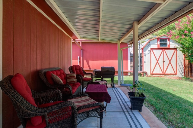 view of patio with a storage unit and outdoor lounge area