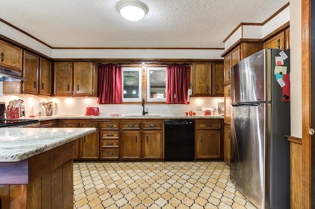 kitchen featuring sink, backsplash, stainless steel appliances, crown molding, and light stone countertops