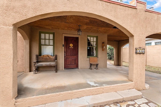 doorway to property with a patio