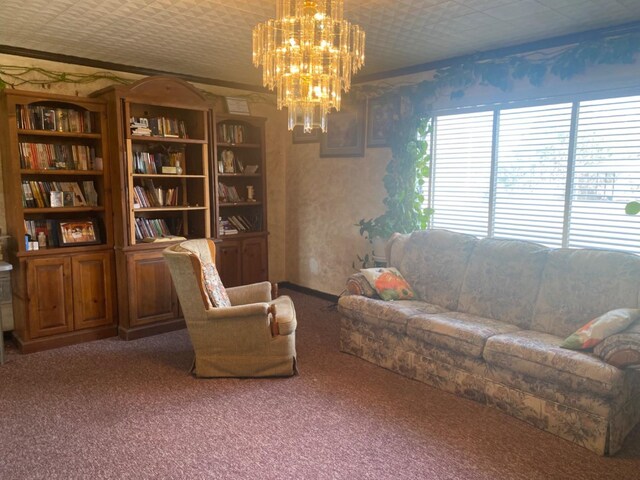 carpeted living room with a notable chandelier and crown molding