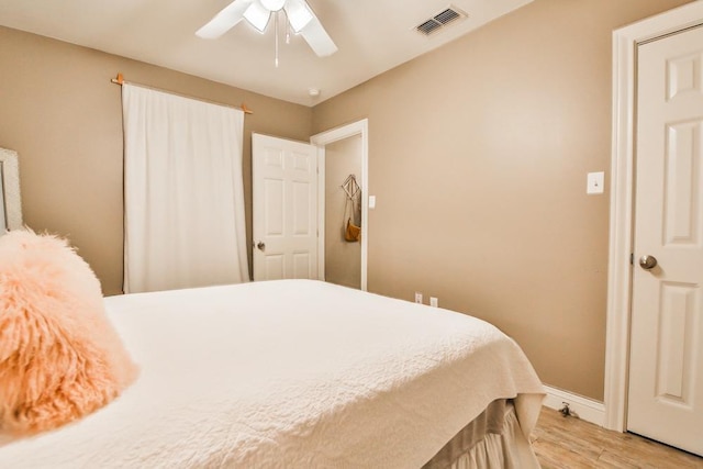 bedroom featuring ceiling fan and light hardwood / wood-style floors