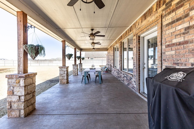 view of patio featuring ceiling fan and grilling area