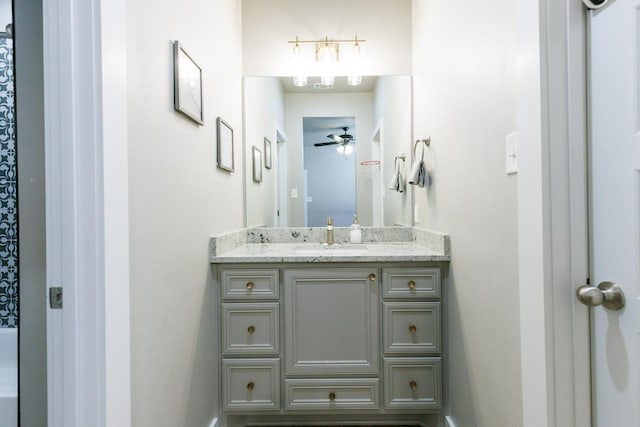 bathroom featuring vanity and ceiling fan