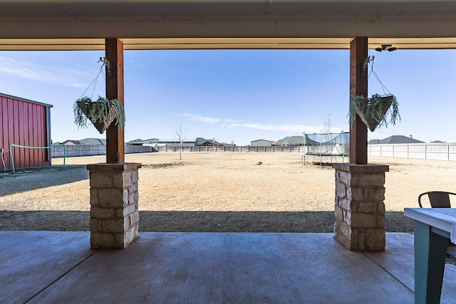 view of yard featuring a trampoline