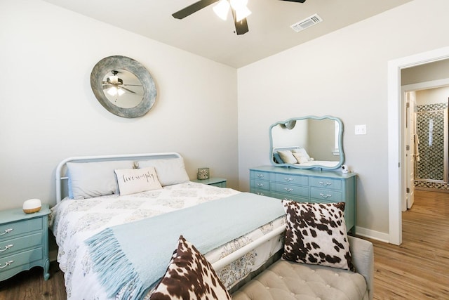 bedroom featuring hardwood / wood-style flooring and ceiling fan