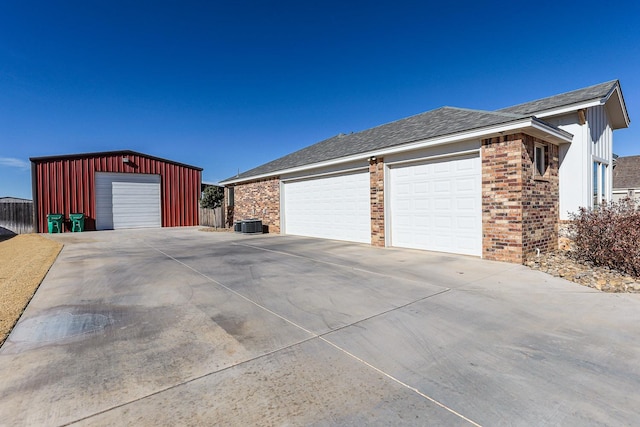 view of side of home with a garage